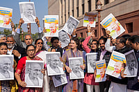 Day In Pics: December 16, 2025 | Photo: PTI/Salman Ali : Congress MP Priyanka Gandhi Vadra and other opposition MPs participate in a protest march against the VB-G RAM G Bill, introduced by the union government to replace the Mahatma Gandhi National Rural Employment Guarantee Act (MGNREGA), 2005, during the Winter session of Parliament, in New Delhi.