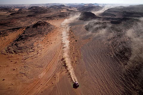 Driver Henk Lategan and co-driver Brett Cummings compete during the fourth stage of the Dakar Rally between Al Henakiyah and Alula, Saudi Arabia, Jan. 8, 2025. 