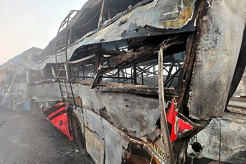 Charred remains of buses after a fog-hit pile-up involving buses and cars sparked fires on the Yamuna Expressway, in Mathura.
