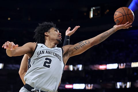 San Antonio Spurs guard Dylan Harper (2) shoots against the New York Knicks during the first half of the NBA Cup championship basketball game in Las Vegas.