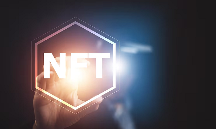 A glowing hexagonal NFT logo against a blue and purple light background.