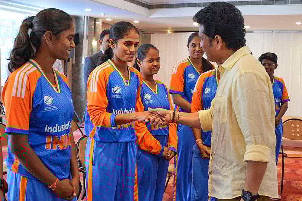 Cricket legend Sachin Tendulkar interacts with the Indian Women’s Blind Cricket Team after they won the T20 Blind Cricket World Cup, at the MIG Cricket Club, in Mumbai.  - | Photo: Handout via PTI
