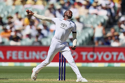 England's Jofra Archer bowls a delivery during play on day one of the third Ashes cricket test between England and Australia at the Adelaide Oval in Adelaide, Australia.