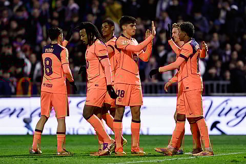 Barcelona's Marcus Rashford, third left, celebrates after scoring his side's second goal with his teammates during the Copa del Rey soccer match between Guadalajara and Barcelona in Guadalajara, Spain.