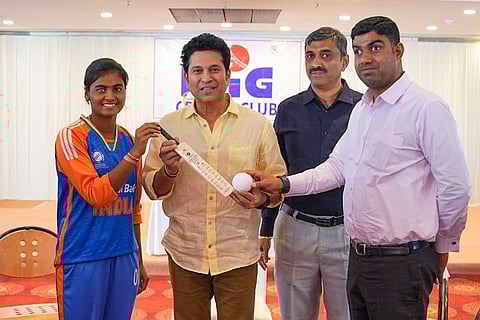 Cricket legend Sachin Tendulkar poses for a picture with the Indian Women’s Blind Cricket Team captain Deepika TC, left, and others, at the MIG Cricket Club, in Mumbai. 