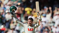 | Photo: AP/James Elsby : Australia's Alex Carey celebrates his century during play on day one of the third Ashes cricket test between England and Australia at the Adelaide Oval in Adelaide, Australia.