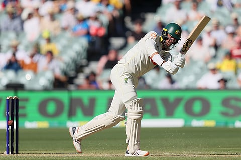 Australia's Mitchell Starc plays a shot during play on day one of the third Ashes cricket test between England and Australia at the Adelaide Oval in Adelaide, Australia.