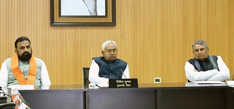 Bihar Chief Minister Nitish Kumar with Deputy Chief Minister Samrat Choudhary holding review meeting of paddy procurement at Samwad on December 5, 2025 in Patna, India. - IMAGO / Hindustan Times