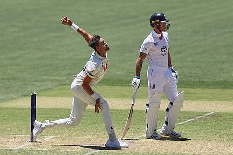 Australia's Mitchell Starc bowls a delivery during play on day two of the third Ashes cricket test between England and Australia in Adelaide, Australia.