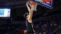 AP : Florida center Olivier Rioux (32) dunks the ball against Saint Francis during the second half of an NCAA college basketball game Wednesday, Dec. 17, 2025, in Gainesville, Fla