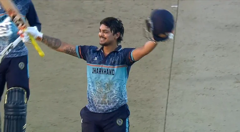 Ishan Kishan celebrates his century for Jharkhand against Haryana in the Syed Mushtaq Ali Trophy final. - X/BCCI Domestic