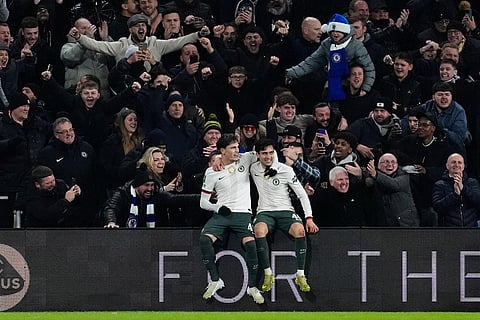 Chelsea's Alejandro Garnacho, left, celebrates with Facundo Buonanotte after scoring their first goal of the game against Cardiff City during the English League Cup quarterfinal soccer match in Cardiff.