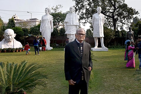 In this file photo, noted sculptor Ram Sutar stands near sculptures of Jawaharlal Nehru Mahatma Gandhi, Sardar Vallabhbhai Patel and Indira Gandhi created by him, during an exhibition at the All India Fine Arts and Crafts Society (AIFACS) Gallery, in New Delhi. Sutar, known for designing the world's tallest statue, ‘Statue of Unity’ in Gujarat, passed away late on Wednesday night at the age of 100 at his Noida residence, his son said. 