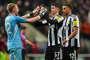 | Photo: Owen Humphreys/PA via AP : Newcastle United goalkeeper Aaron Ramsdale, left, celebrates with Lewis Miley (67) and Malick Thiaw (12) after the English League Cup quarterfinal soccer match between Newcastle and Fulham in Newcastle upon Tyne, England.