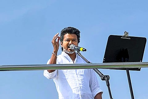 Tamilaga Vettri Kazhagam (TVK) chief Vijay addresses a public meeting, in Erode, Tamil Nadu.