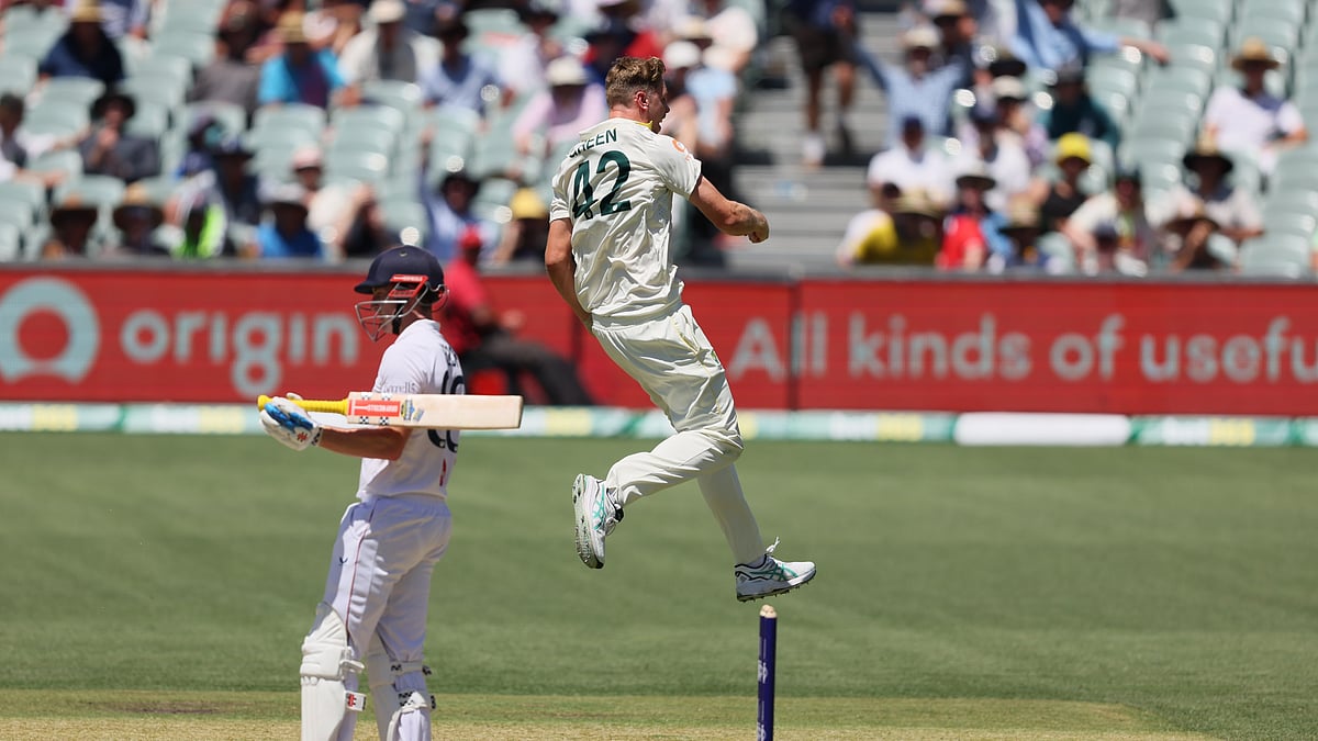 Australia's Cameron Green, right, celebrates the wicket of England's Harry Brook, left , during play on day two of the third Ashes cricket test between England and Australia in Adelaide, Australia, Thursday, Dec. 18, 2025.  - (AP Photo/James Elsby)a