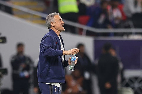 PSG's head coach Luis Enrique gives instructions from the side line during the FIFA Intercontinental Cup final soccer match between Flamengo and Paris Saint-Germain in Doha, Qatar.