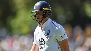 AP : Jamie Smith leaves the field after losing his wicket on day two of the third Ashes Test between England and Australia in Adelaide.