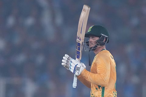 South Africa's Quinton de Kock celebrates after scoring fifty runs during the fifth T20 cricket match between India and South Africa in Ahmedabad.