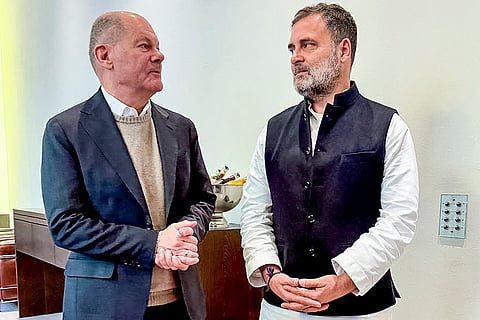 LoP in the Lok Sabha and Congress leader Rahul Gandhi with the former Chancellor of Germany Olaf Scholz during a meeting, in Germany. 