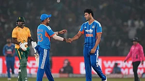 | Photo: AP/Rafiq Maqbool : India's Shivam Dube, right, congratulates India's captain Suryakumar Yadav after winning the first T20 International cricket match between India and South Africa in Cuttack.