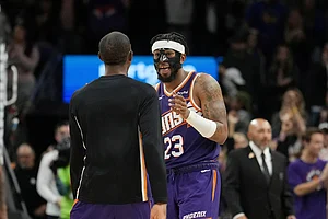 | Photo: AP/Ross D. Franklin : Phoenix Suns guard Jordan Goodwin (23) celebrates his game-winning free throw against the Golden State Warriors with Suns guard Jamaree Bouyea as time expires during the second half of an NBA basketball game in Phoenix.