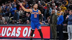 Jalen Brunson #11 of the New York Knicks celebrates after making a shot in the fourth quarter against the Indiana Pacers at Gainbridge Fieldhouse on December 18, 2025 in Indianapolis, Indiana.