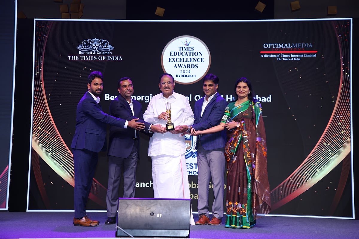 Manchester Global School receiving an award