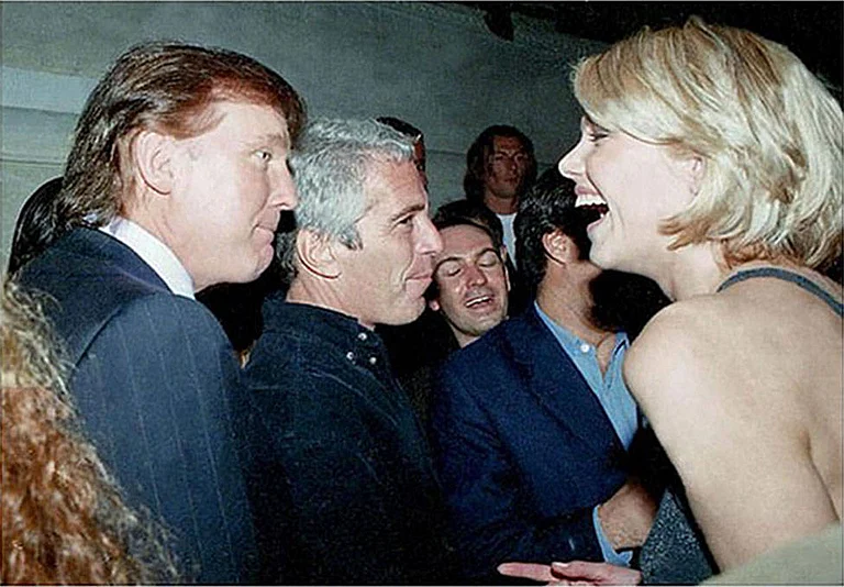 Epstein photo release by House Oversight Committee Donald Trump, Jeffrey Epstein and a woman speaking at an undated event - IMAGO / Capital Pictures