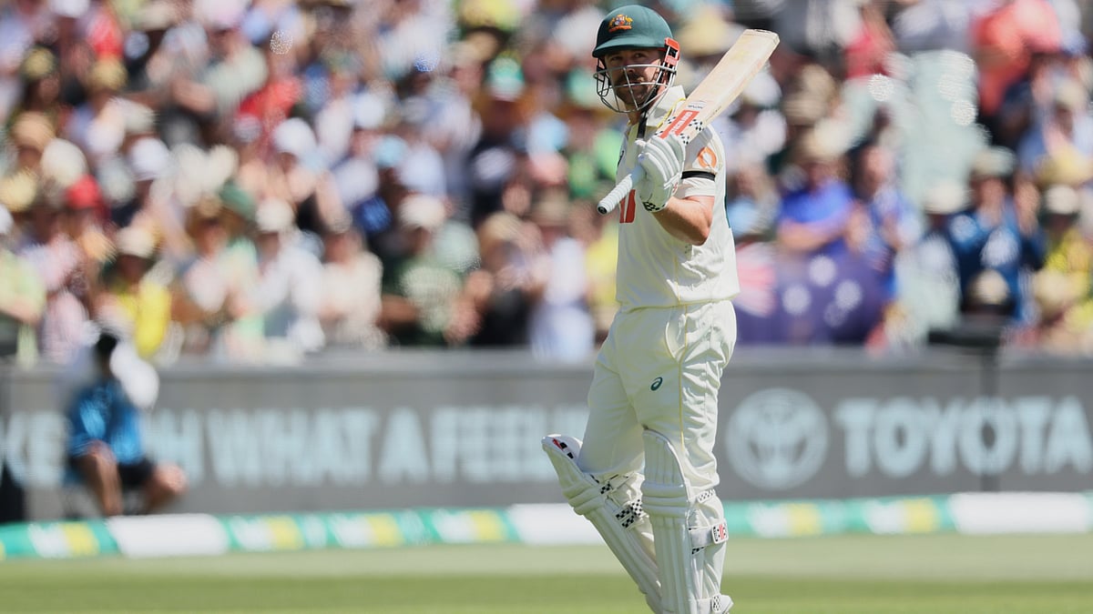 | Photo: AP/James Elsby : Australia's Travis Head gestures to the crowd as he walks from the field after he was dismissed during play on day four of the third Ashes cricket test between England and Australia in Adelaide, Australia, Saturday, Dec. 20, 2025.