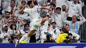 (AP Photo/Manu Fernandez) : Real Madrid's Jude Bellingham celebrates after scoring the opening goal during the Spanish La Liga soccer match between Real Madrid and Sevilla in Madrid, Spain, Saturday, Dec. 20, 2025