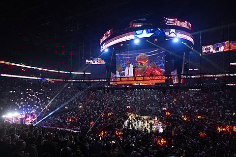 Jake Paul walks into the ring for his heavyweight boxing match against Anthony Joshua in Miami.