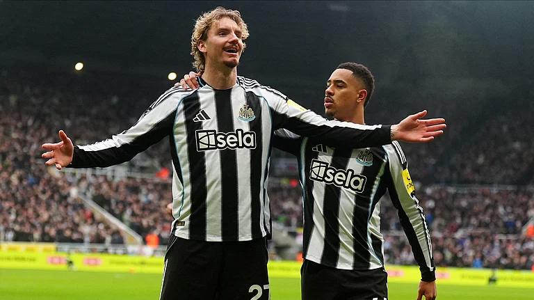 Newcastle's Nick Woltemade, left, celebrates after scoring the opening goal during the English Premier League soccer match. - AP/Owen Humphreys