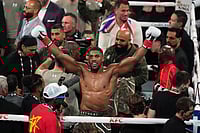 | Photo: AP/Lynne Sladky : Anthony Joshua celebrates after his win in the heavyweight boxing match against Jake Paul in Miami, Fla.