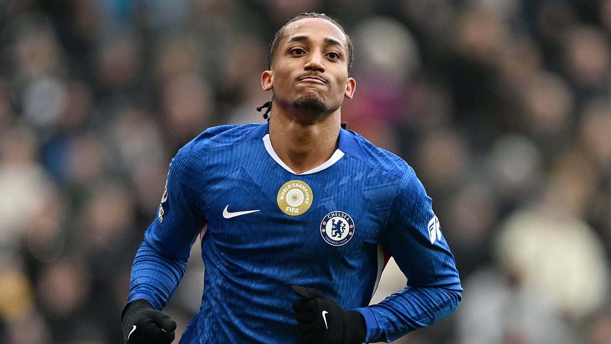 Joao Pedro wheels away in celebration after scoring against Newcastle United - null