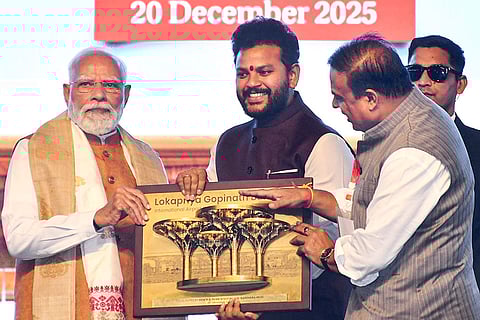 Prime Minister Narendra Modi, left, with Union Minister of Civil Aviation K Rammohan Naidu, centre, and Assam Chief Minister Himanta Biswa Sarma during the inauguration of a new terminal of the Lokapriya Gopinath Bardoloi International Airport, in Guwahati, Assam.
