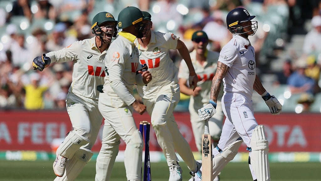 Australian players celebrate after England's Ben Stokes, right, was dismissed during play on day four of the third Ashes Test in Adelaide. - AP