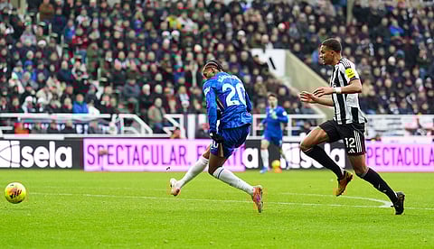 Chelsea's Joao Pedro, left, scores his side's second goal during the English Premier League soccer match between Newcastle United and FC Chelsea in Newcastle, England.