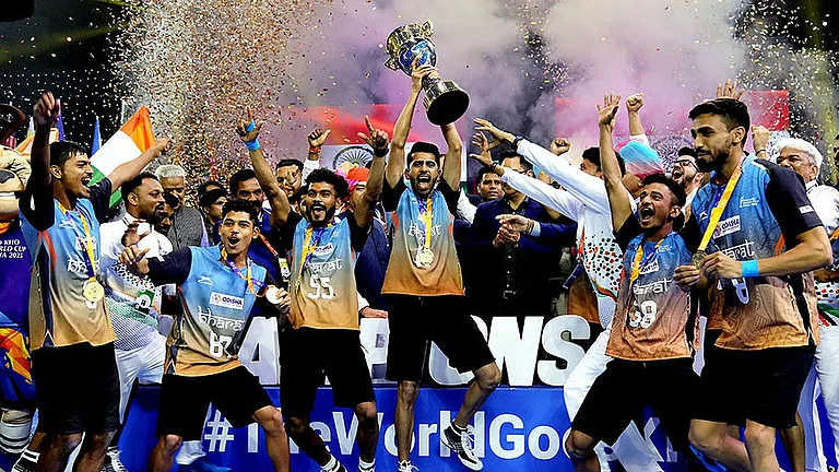 The Indian men's team celebrates with the trophy after winning the inaugural Kho Kho World Cup in New Delhi. - File/PTI