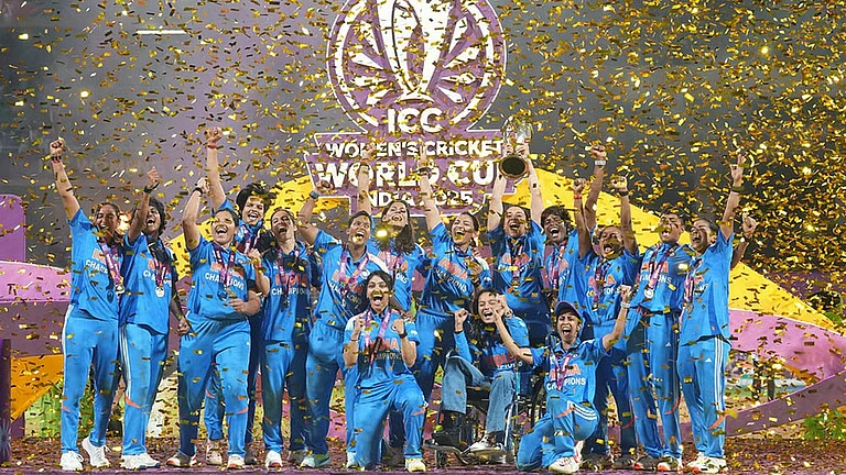 India celebrate with the trophy after their win over South Africa in the ICC Women's Cricket World Cup final in Navi Mumbai. - AP