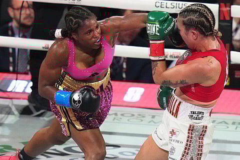 Caroline Dubois, left, and Camila Panatta, right, compete during their WBC lightweight world title fight in Miami.