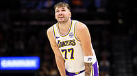Luka Doncic #77 of the Los Angeles Lakers looks on during the second half of a game against the Phoenix Suns at Mortgage Matchup Center on December 14, 2025 in Phoenix, Arizona.