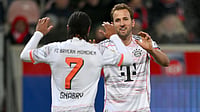 Kane and Gnabry celebrate Bayern's fourth goal