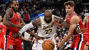 LeBron James battles for the ball against the Clippers