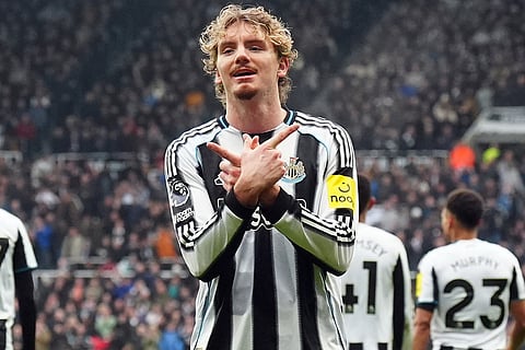 Newcastle's Nick Woltemade celebrates after scoring his side's second goal during the English Premier League soccer match between Newcastle United and FC Chelsea in Newcastle, England.