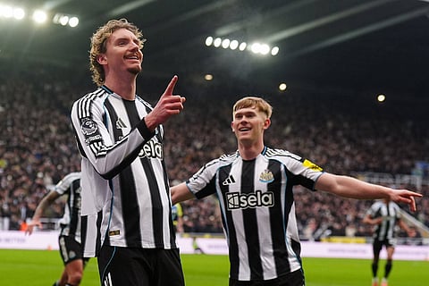 Newcastle's Nick Woltemade, left, celebrates after scoring his side's second goal during the English Premier League soccer match between Newcastle United and FC Chelsea in Newcastle, England.