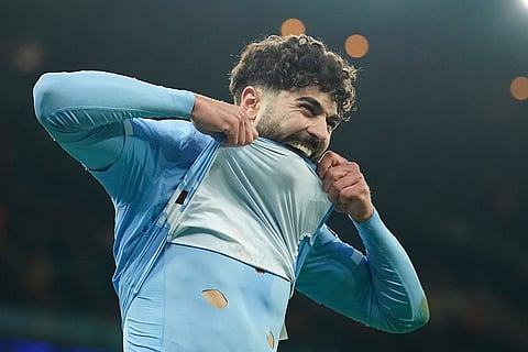 Manchester City's Josko Gvardiol reacts after missing a chance to score a goal during the English Premier League soccer match between Manchester City and West Ham United in Manchester, England.