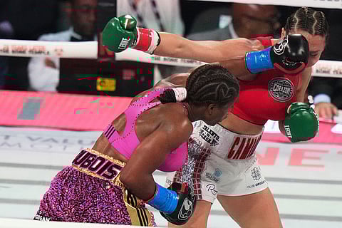 Caroline Dubois, left, and Camila Panatta compete during their WBC lightweight world title fight in Miami.