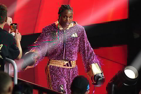 Caroline Dubois walks to the ring before her WBC lightweight world title fight against Camila Panatta in Miami.