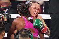 | Photo: AP/Lynne Sladky : Camila Panatta, right, embraces Caroline Dubois, left, after Dubois won their WBC lightweight world title fight in Miami.